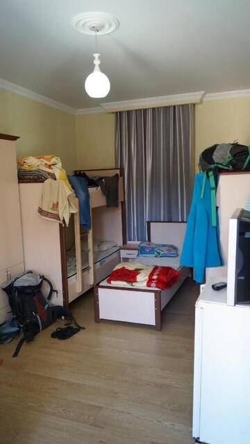 Фото номера Односпальная кровать в общем номере с 4 кроватями Хостелы TJ+ Hostel г. Батуми 3
