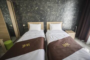 Фото номера Стандартные апартаменты Отель Beach House Hotel г. Батуми 3
