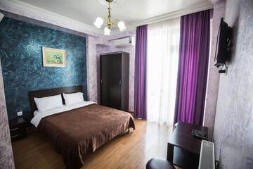 Фото номера Стандартный четырехместный номер Отель Beach House Hotel г. Батуми 5