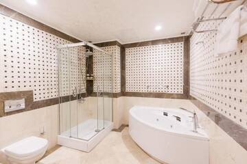 Фото номера Президентский люкс Отель Divan Suites Batumi г. Батуми 10