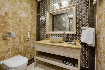 Фото номера Люкс с пакетом бизнес-услуг Отель Divan Suites Batumi г. Батуми 4