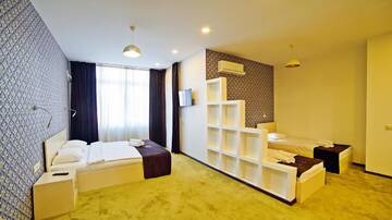 Фото номера Семейный номер Делюкс Отель Mardi Plaza Hotel г. Батуми 9