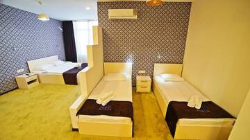 Фото номера Семейный номер Делюкс Отель Mardi Plaza Hotel г. Батуми 11