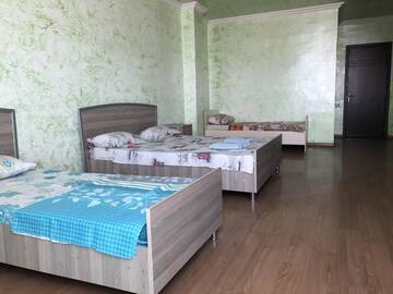 Фото номера Стандартный четырехместный номер Отель M-Palace Hotel г. Батуми 5