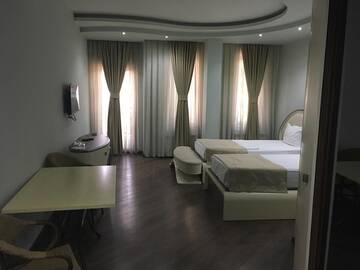 Фото номера Стандартный двухместный номер с 2 отдельными кроватями Отель Light Palace Hotel г. Батуми 3