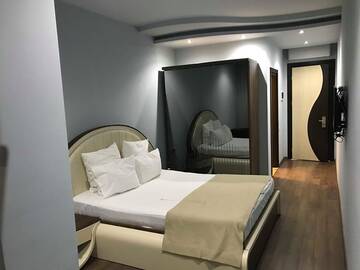 Фото номера Стандартный двухместный номер с 1 кроватью Отель Light Palace Hotel г. Батуми 4