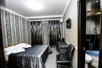 Фото номера Двухместный номер с 1 кроватью и балконом Гостевой дом TemHouse Guest House г. Батуми 3