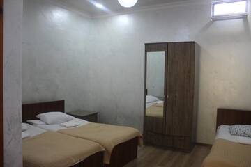 Фото номера Четырехместный номер с собственной ванной комнатой Гостевой дом Guest House On Asatiani г. Батуми 21
