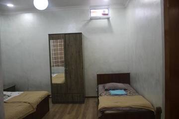 Фото номера Четырехместный номер с собственной ванной комнатой Гостевой дом Guest House On Asatiani г. Батуми 17