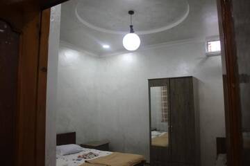 Фото номера Четырехместный номер с собственной ванной комнатой Гостевой дом Guest House On Asatiani г. Батуми 8