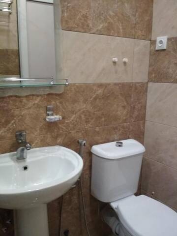 Фото номера Трехместный номер с балконом Гостевой дом Guesthouse Melikishvili 57 г. Батуми 13