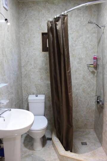Фото номера Трехместный номер Гостевой дом Holiday Home Data г. Батуми 58