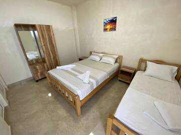 Фото номера Трехместный номер с ванной комнатой Гостевой дом Rudi Guest House г. Батуми 3