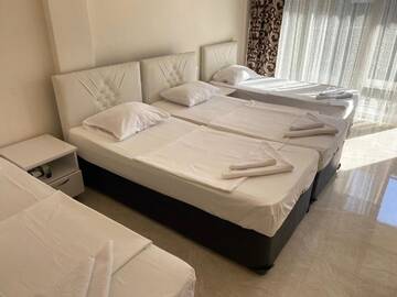 Фото номера Четырехместный номер с ванной комнатой Гостевой дом Rudi Guest House г. Батуми 31