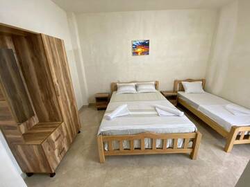 Фото номера Трехместный номер с ванной комнатой Гостевой дом Rudi Guest House г. Батуми 4
