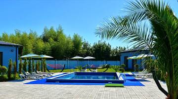 Фото номера Коттедж с 2 спальнями Гостевой дом Paradise Garden г. Батуми 8
