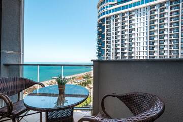 Фото номера Полулюкс с видом на море Отель Orbi Sea Towers Hotel Official г. Батуми 4