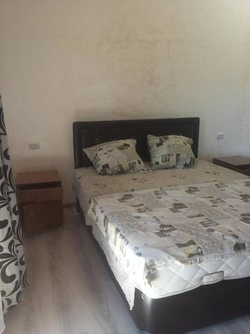 Фото номера Двухместный номер Делюкс с 1 кроватью и балконом Гостевой дом Guesthouse Achi г. Батуми 13