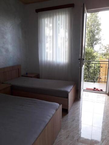 Фото номера Трехместный номер с видом на море Гостевой дом Guesthouse Achi г. Батуми 14