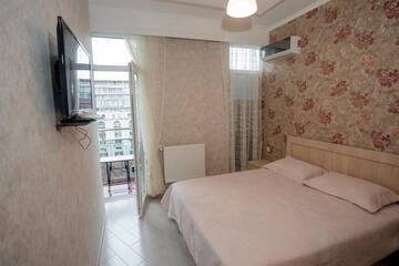 Фото номера Бюджетный двухместный номер с 1 кроватью Мини-отель 5 Rooms г. Батуми 18