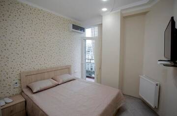 Фото номера Бюджетный двухместный номер с 1 кроватью Мини-отель 5 Rooms г. Батуми 19