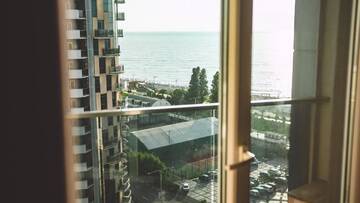 Фото номера Апартаменты с 1 спальней Апарт-отели Apart Hotel Orbi Towers г. Батуми 17