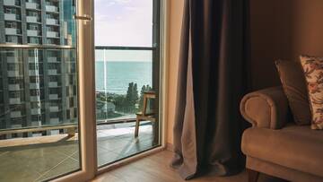 Фото номера Апартаменты с 1 спальней Апарт-отели Apart Hotel Orbi Towers г. Батуми 6