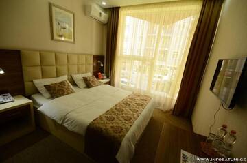Фото номера Стандартный двухместный номер с 1 кроватью Отель City Hotel г. Батуми 4