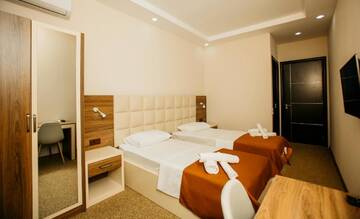 Фото номера Стандартный двухместный номер с 2 отдельными кроватями Отель City Hotel г. Батуми 3