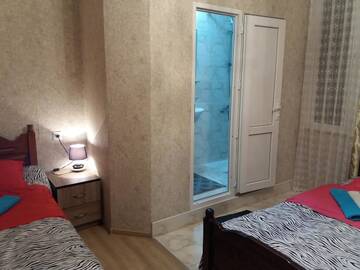 Фото номера Трехместный номер с собственной ванной комнатой Гостевой дом Guesthouse Next to beach г. Батуми 22
