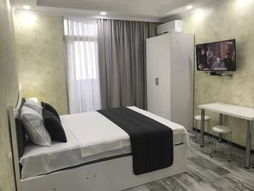 Фото номера Люкс, вид на море Апарт-отели Aparthotel Selfie г. Батуми 4