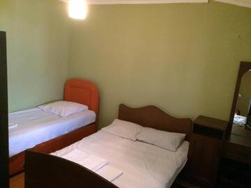 Фото номера Стандартный трехместный номер Проживание в семье Homestay Seaside by Manuchar г. Батуми 4