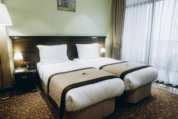 Фото номера Стандартный двухместный номер с 2 отдельными кроватями Отель Colosseum Marina Hotel г. Батуми 2