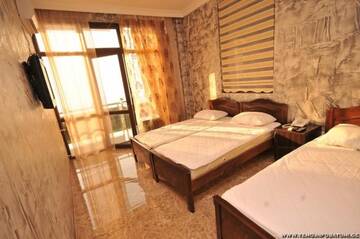Фото номера Трехместный номер с кухней Отель Hotel Temo in Batumi г. Батуми 3