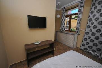 Фото номера Двухместный номер с 1 кроватью и террасой Мини-отель Maxim Mini Hotel г. Батуми 7