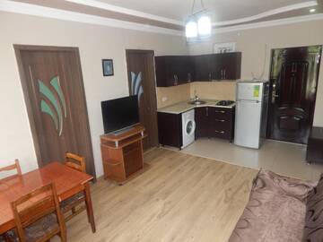 Фото номера Апартаменты с 2 спальнями Апарт-отели ApartHotel My Home г. Батуми 9