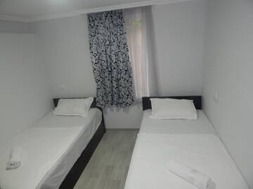 Фото номера Апартаменты с 2 спальнями Апарт-отели ApartHotel My Home г. Батуми 19
