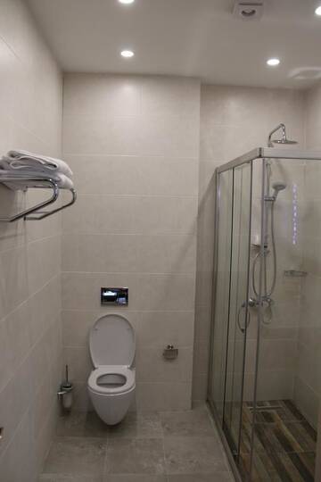 Фото номера Апартаменты с 3 спальнями Апарт-отели Odisea Apart Hotel г. Батуми 11