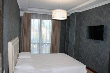 Фото номера Апартаменты с 3 спальнями Апарт-отели Odisea Apart Hotel г. Батуми 12