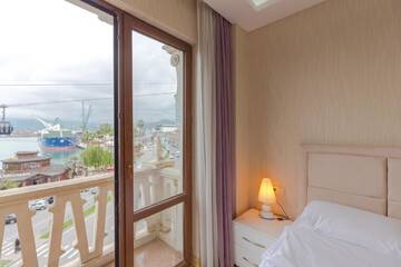 Фото номера Апартаменты Делюкс Апарт-отели Odisea Apart Hotel г. Батуми 4