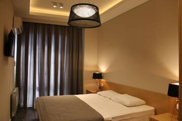 Фото номера Апартаменты с 2 спальнями Апарт-отели Odisea Apart Hotel г. Батуми 4