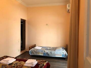 Фото номера Трехместный номер Делюкс с видом на море Гостевой дом Ekaterine Guest House г. Батуми 13