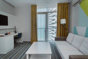 Фото номера Семейный номер с видом на море Апарт-отели Aparthotel Tangerine г. Батуми 8