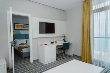 Фото номера Семейный номер с видом на море Апарт-отели Aparthotel Tangerine г. Батуми 12