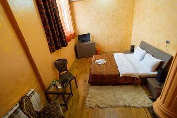 Фото номера Двухместный номер Делюкс с 1 кроватью Отель hotel amber г. Батуми 7