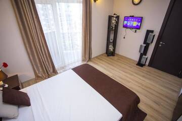 Фото номера Апартаменты с 2 спальнями Отель Blue Star Batumi г. Батуми 7