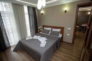 Фото номера Апартаменты с 1 спальней Отель Blue Star Batumi г. Батуми 5