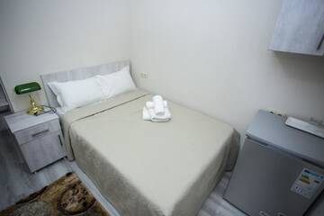 Фото номера Небольшой двухместный номер с 1 кроватью Отель Hotel Garanti г. Батуми 3