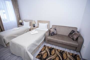 Фото номера Двухместный номер с 2 отдельными кроватями Отель Hotel Garanti г. Батуми 5