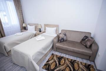 Фото номера Двухместный номер с 2 отдельными кроватями Отель Hotel Garanti г. Батуми 3